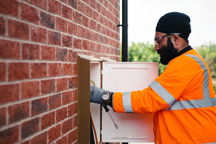 Cadent engineer checking the connections