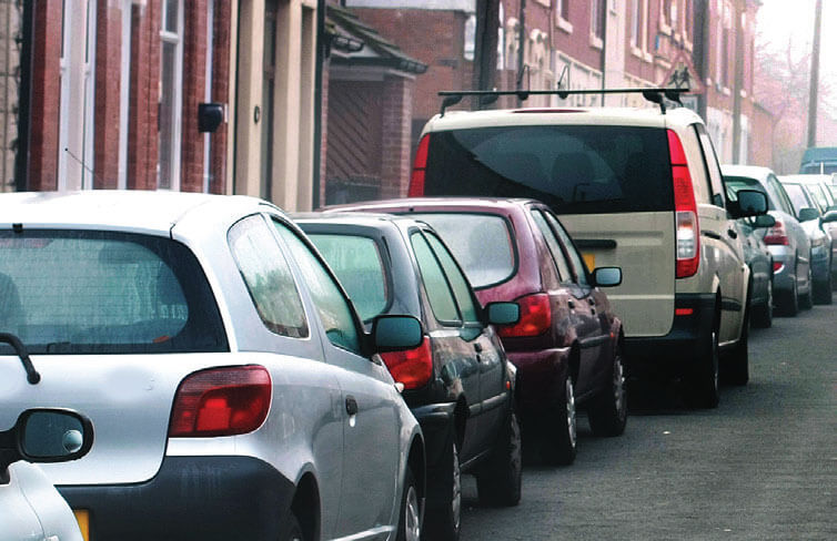 Vehicles parked along both sides