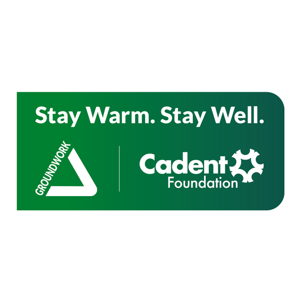 Green background with white text reads 'Stay Warm. Stay Well.' Logos for Groundwork and Cadent Foundation are featured, conveying a supportive message.