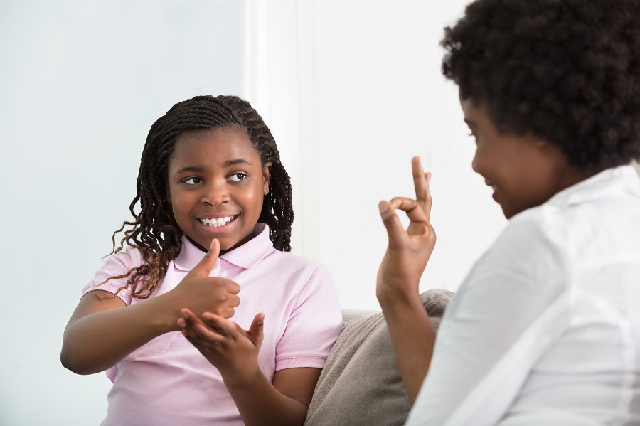 PSR-Deaf-Mother-Talking-Sign-Language-With-Her-Daughter