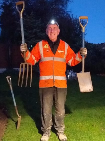 Michael Hill the Cadent engineer holding the digging equipments.