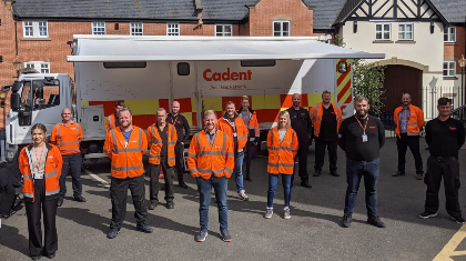 A group of engineers standing in high vis jackets outside our emergency mobile command unit following a loss of gas incident in Tattenhall, Chester