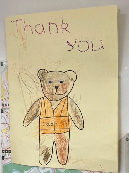 A hand made thank you card with a drawing of Cadent Ted, given to our engineers after helping to turn gas back on for a primary school