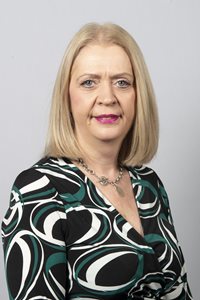 Angela Love, Chair of the Customer Challenge Group, headshot